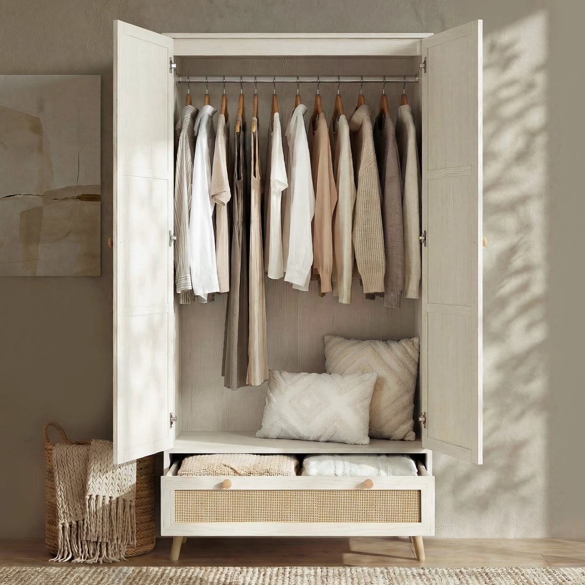 [White] Wovena rattan bedroom furniture set wardrobe with both doors open showing hanging rail of clothes and cushions