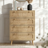 [Oak] Wovena chest styled front-facing against a white panelled wall with books, candles, and a dark vase on top