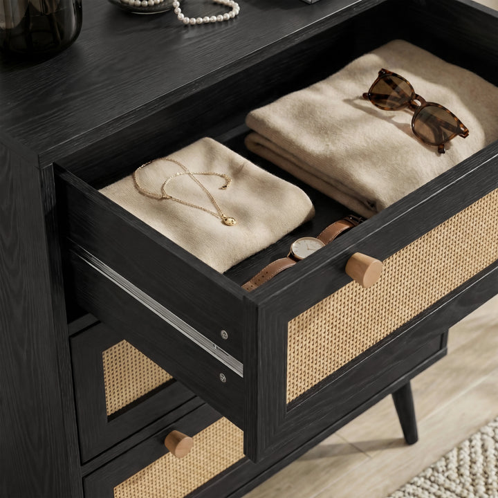[Black] Wovena rattan chest top drawer extended, wood knob and cane mesh panel in view
